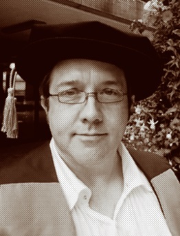 Sepia photograph of Dr. Secular in academic dress